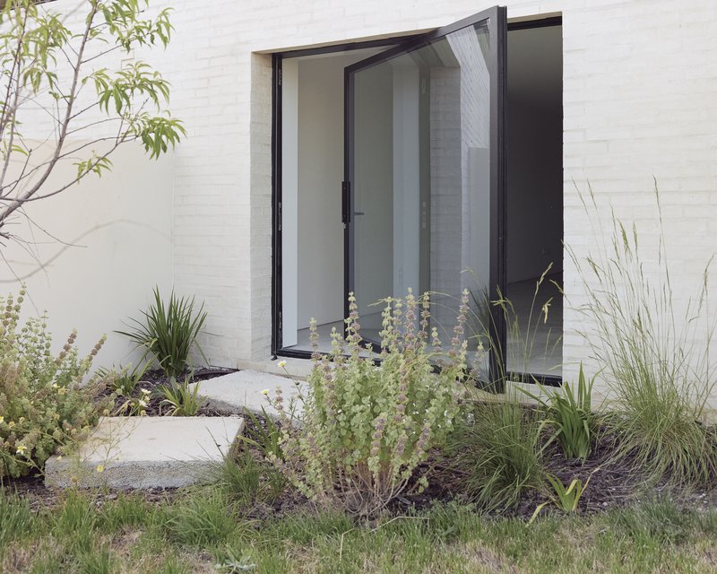 Edifício Residencial Parede Townhouses / extrastudio - Fotografia de Exterior, Concreto